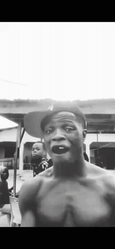 Shirtless Man In Hat Making Funny Face GIF