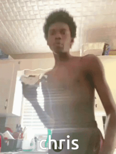 Shirtless Man In Kitchen With Chris Written Below GIF