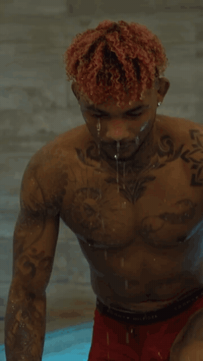 Shirtless Man In Red Boxer Shorts Standing In Pool GIF