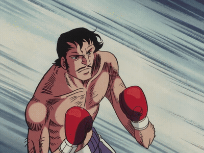 Shirtless Man in Red Boxing Gloves