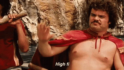 Shirtless Man In Red Cape Standing At Rocky Cliff GIF