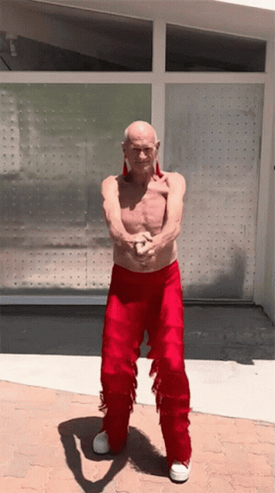 Shirtless Man In Red Pants With Fringe GIF