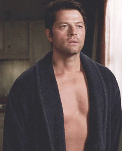 Shirtless Man In Robe Looking At Camera GIF