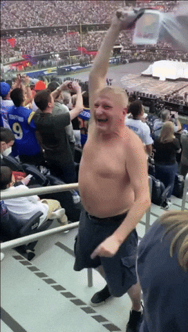 Shirtless Man In Stadium Number 9 GIF