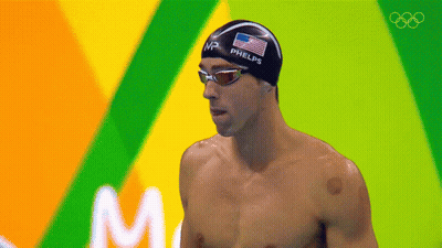 Shirtless Man in Swim Cap Saying Phels