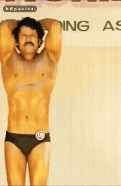 Shirtless Man In Underwear Before Body Building Sign GIF