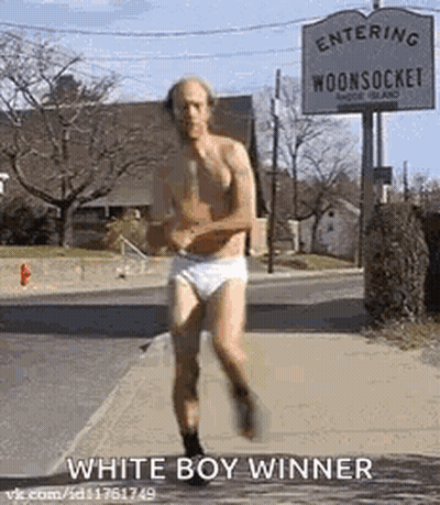 Shirtless Man In Underwear Running Past Entering Woonsocket Sign GIF