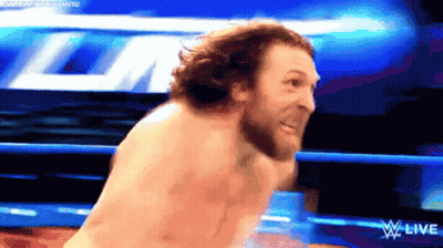 Shirtless Man In Wrestling Ring With W Live Logo GIF