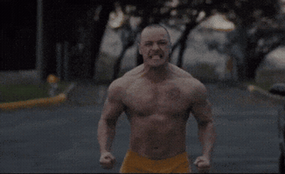 Shirtless Man In Yellow Shorts Running GIF