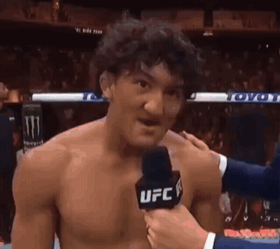 Shirtless Man Interviewed By UFC Reporter In Boxing Ring GIF