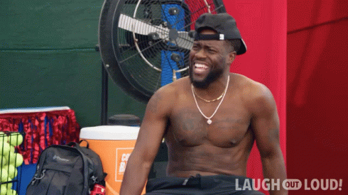 Shirtless Man Laughing In Front Of Fan Laugh Out Loud Logo GIF