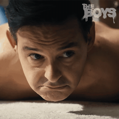 Shirtless Man Laying On Floor Saying Boys GIF