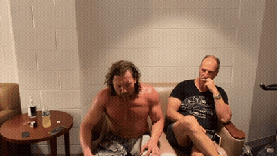 Shirtless Man Next To Another Man On Couch GIF