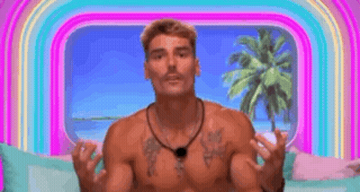 Shirtless Man On Couch With Hands Up Before Rainbow GIF