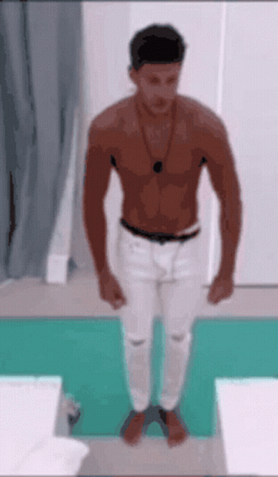 Shirtless Man On Green Mat GIF