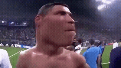 Shirtless Man On Soccer Field Surrounded By People GIF