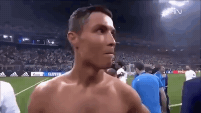 Shirtless Man On Soccer Field With Crowd GIF
