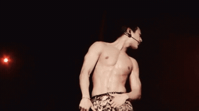Shirtless Man On Stage With Microphone GIF