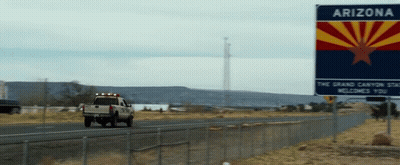 Shirtless Man Playing Basketball In Front Of Ice Sign GIF