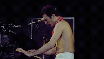 Shirtless Man Playing Piano With Bandana GIF