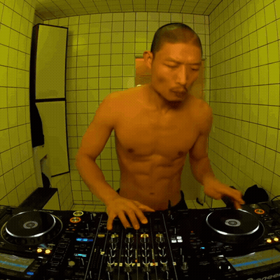 Shirtless Man Playing Pioneer DJ Mixer GIF