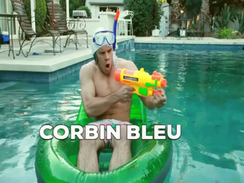 Shirtless Man Playing With Water Gun In Pool Corbin Bleu GIF