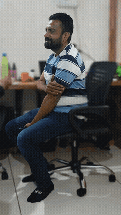Shirtless Man Pointing At Camera In Front Of Crowd GIF