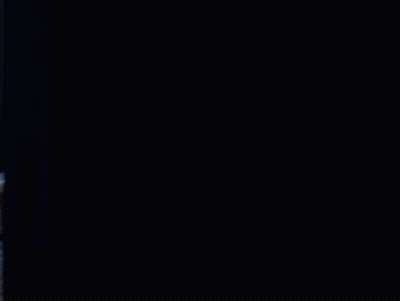 Shirtless Man Reading Newspaper On Bed GIF