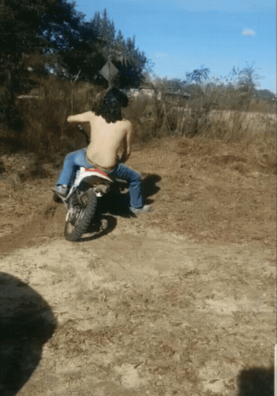 Shirtless Man Riding Dirt Bike GIF
