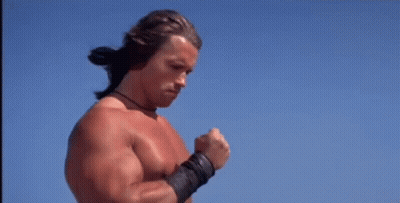Shirtless Man Running In Front Of Gallery Entrance Sign GIF