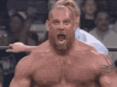 Shirtless Man Screaming In Wrestling Ring GIF