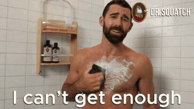 Shirtless Man Shaving In Shower Saying I Can't Get Enough GIF