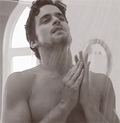 Shirtless Man Showering In Front Of Mirror GIF