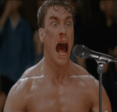 Shirtless Man Singing Into Microphone GIF