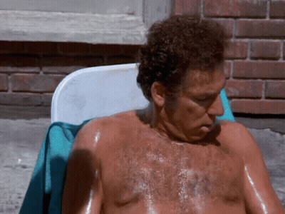 Shirtless Man Sitting In Chair GIF