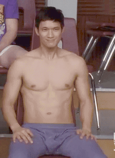 Shirtless Man Sitting In Chair With Pants Down GIF