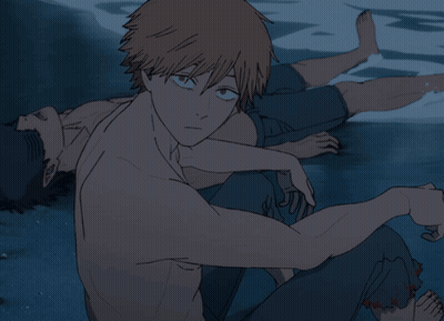 Shirtless Man Sitting Next To Another Man GIF