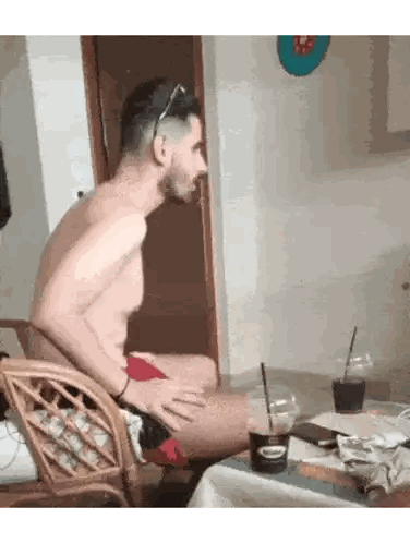 Shirtless Man Sitting With Coffee Sticker