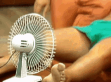 Shirtless Man Sleeping On Couch Ventilating Hot Weather GIF