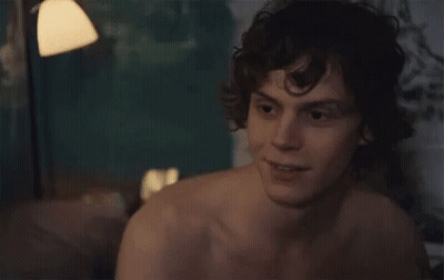 Shirtless Man Smiling On Bed GIF