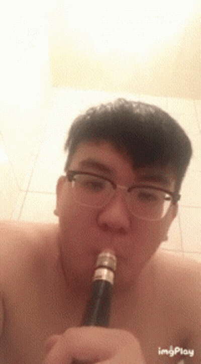 Shirtless Man Smoking Pipe With Glasses GIF
