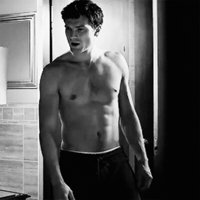 Shirtless Man Standing In Bathroom GIF