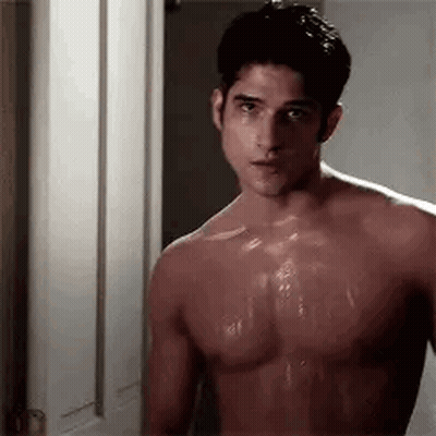 Shirtless Man Standing In Bathroom Door GIF
