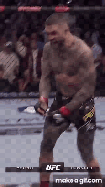 Shirtless Man Standing In Boxing Ring GIF