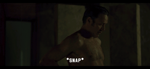 Shirtless Man Standing In Dark Room Snap GIF