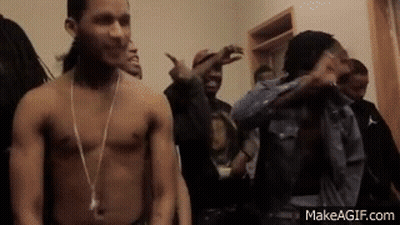 Shirtless Man Standing In Front Of Crowd GIF