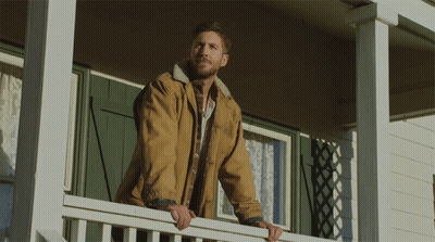 Shirtless Man Standing In Front Of White Wall GIF