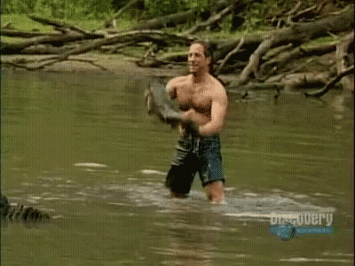 Shirtless Man Standing In River Discovery Channel GIF