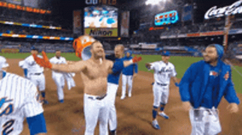 Shirtless Man Standing On Baseball Field GIF