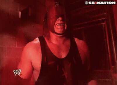 Shirtless Man Standing On Pole In City GIF